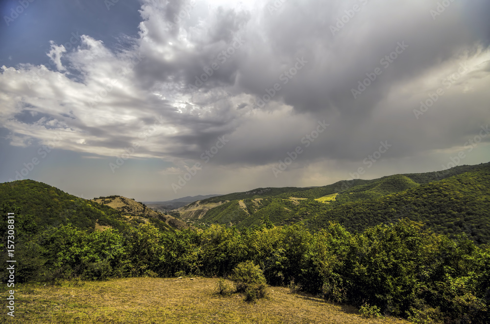 Obraz premium Majestic cloudy mountains landscape. Dramatic sky clouds. Azerbaijan, Big Caucasus mountains. Ganja