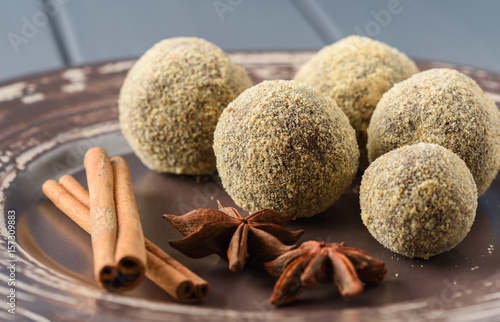 Healthy homemade chocolate sweets in bread crumbs decorated with cinnamon and star anise