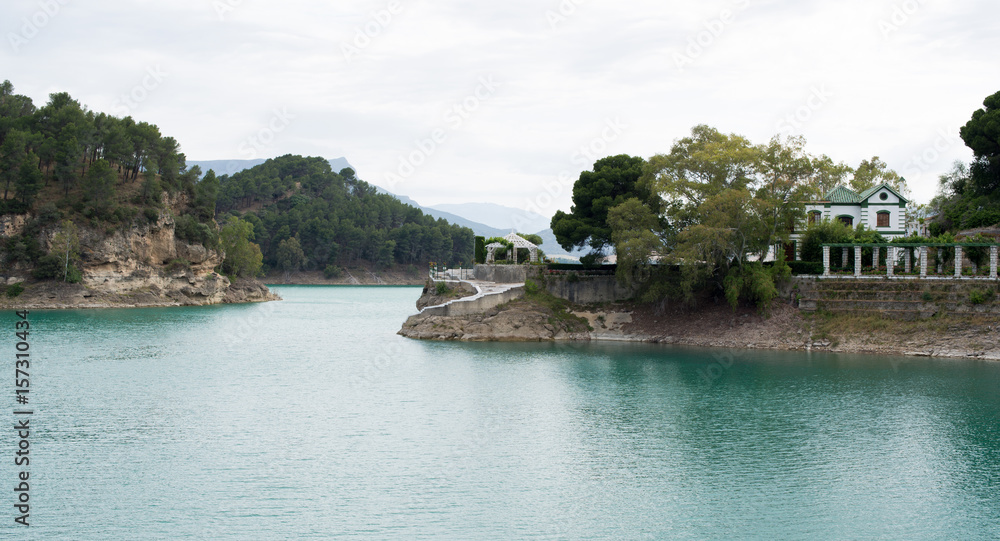 Nice view El Chorro Lake with turquoise green water and green trees on heels, daytime, landscape, Malaga, Spain.