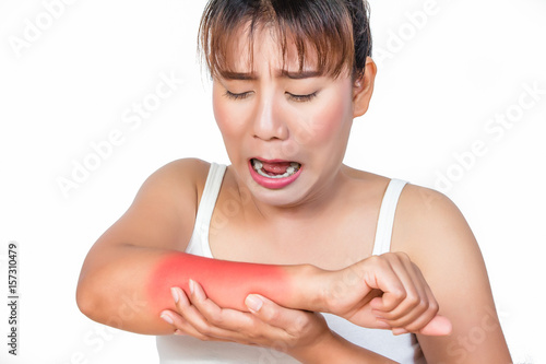 Wallpaper Mural Asian woman having arm pain Torontodigital.ca