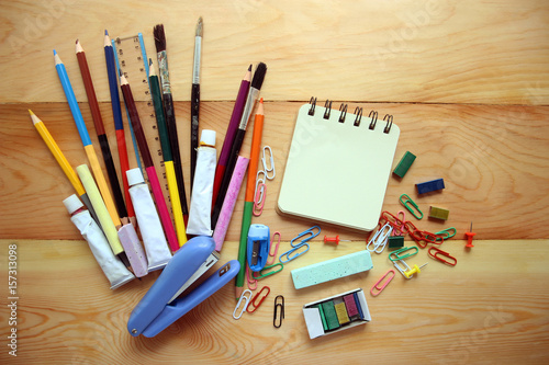 Stationery on a wooden background