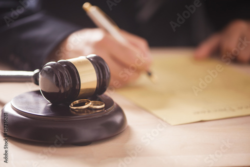  Judge with gavel on table photo