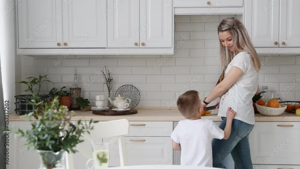 the little boy asks mom in the kitchen candy the little boy asks mom in the kitchen candy