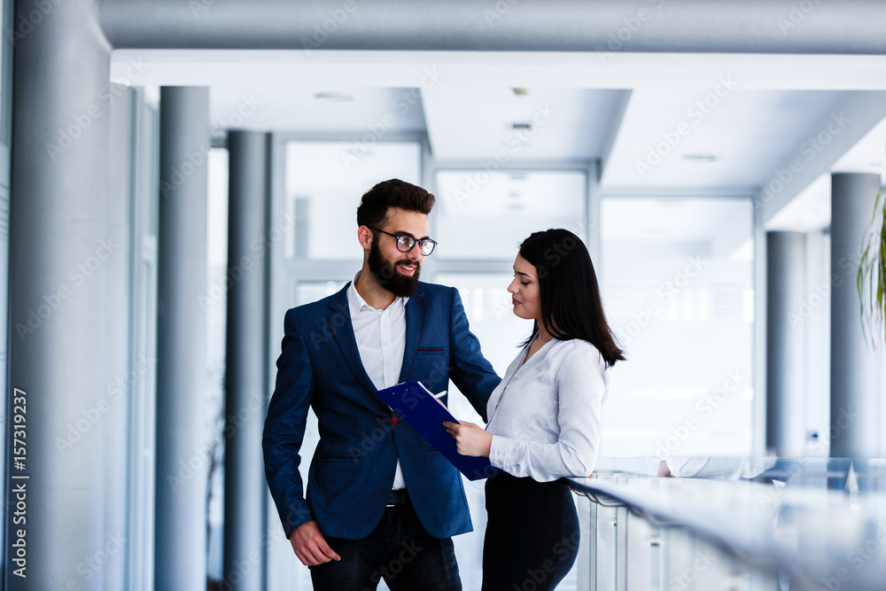 Business couple discussing about their job and planing how to success Business couple discussing about their job and planing how to success