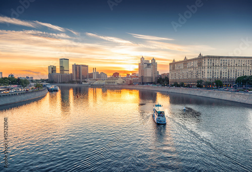 City boat on Moscow river at sunset. Beautiful city landscape