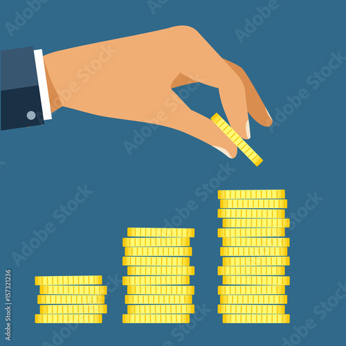 Hand put coin to money staircase. Profit. Making money. For business and finance concept.