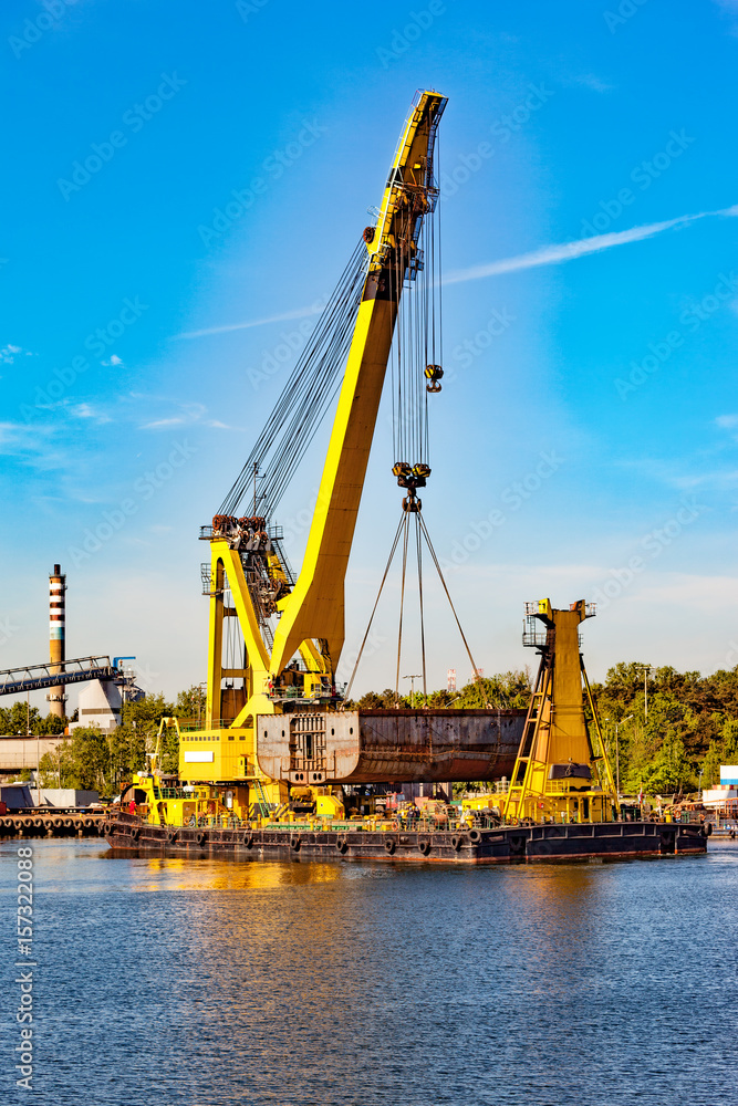 Huge floating crane at work in port of Gdansk, Poland.