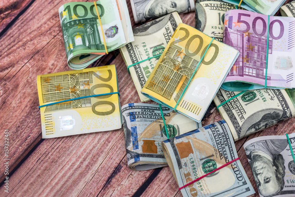 Obraz premium dollar and euro notes for background as business concept.