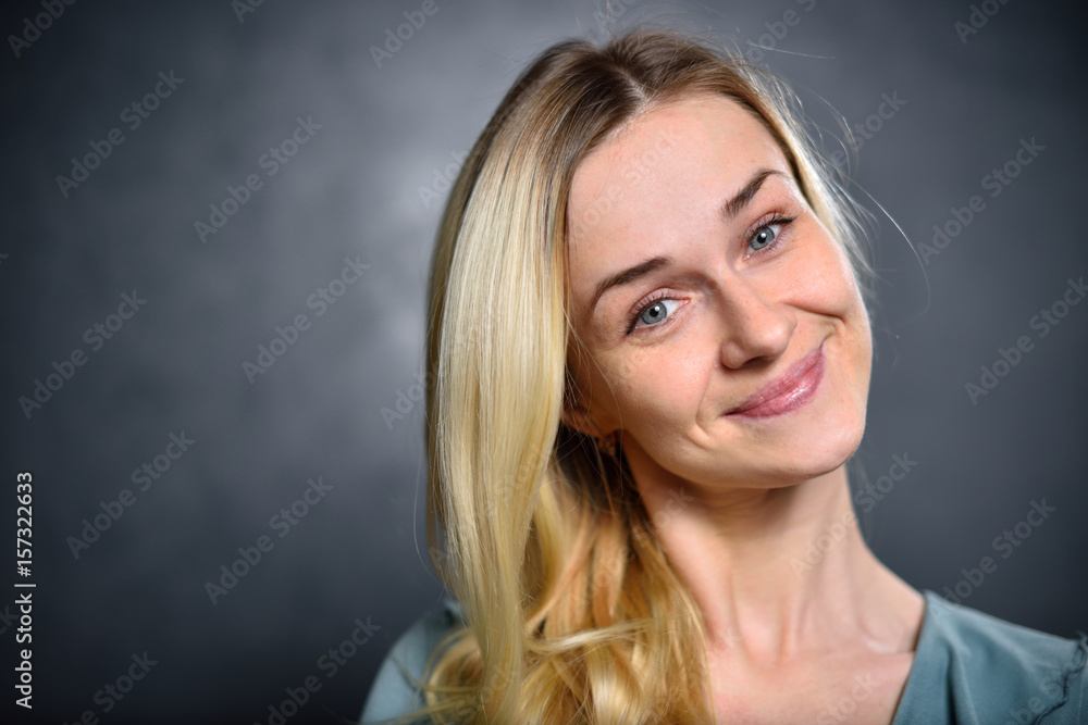 Blonde girl smiling face closeup Blonde girl smiling face closeup