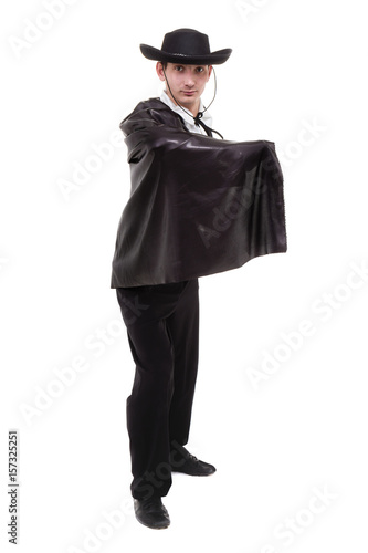 man wearing a zorro costume posing, isolated on white