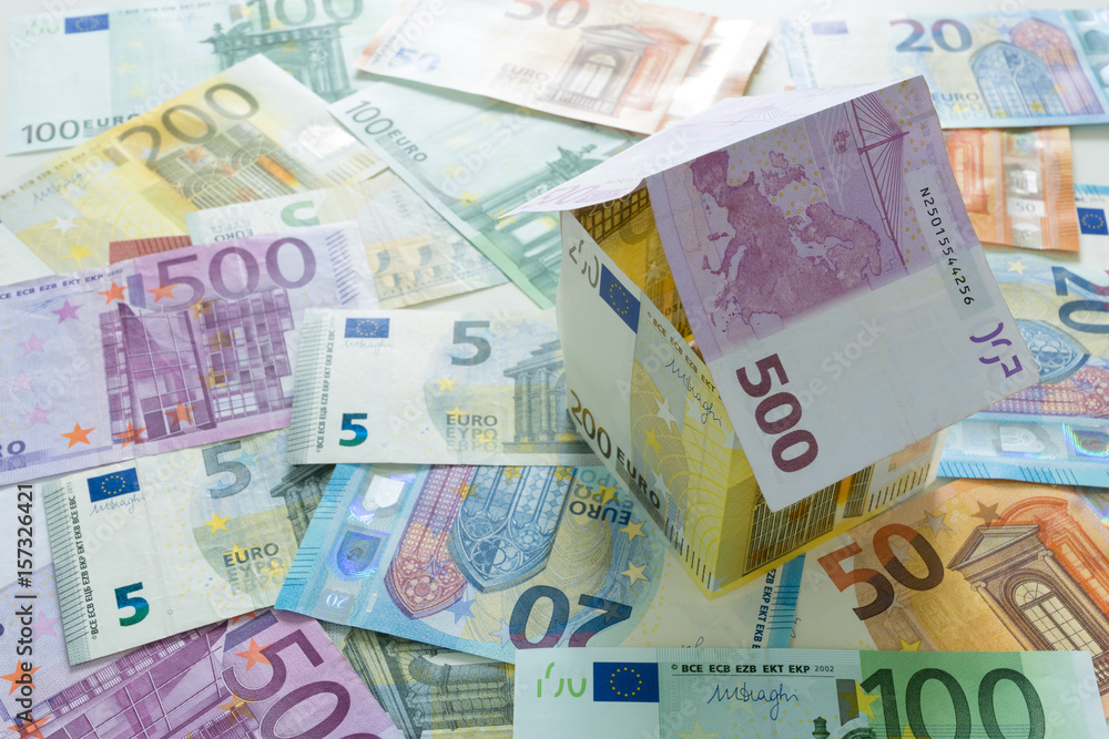 Euro house on euro banknotes background Euro house on euro banknotes background