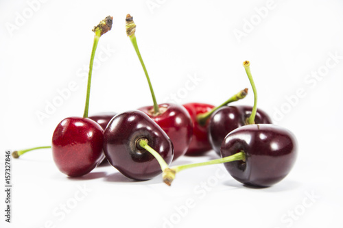 Cherry isolated on white background. Sweet ripe cherry. Beautiful read fresh cherry on a white background.