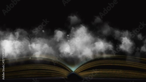 Book in the fog. Mysterious smoke enveloped the book photo