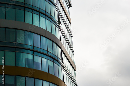 Windows of high-rise office building in blue color