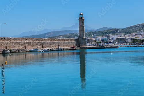 The old Venetian harbor with Lighthouse in Rethymno. Crete, Greece.