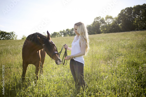 Blonde Female with a Horse in Rural Virginia