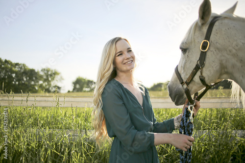 Blonde Female with a Horse in Rural Virginia