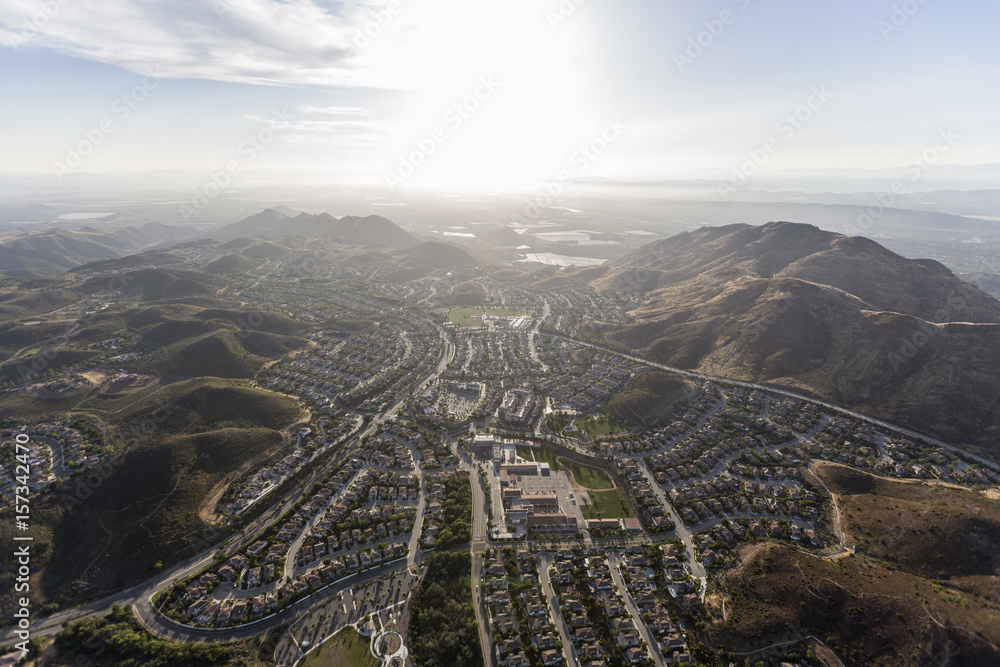 Aerial view of suburban homes and hills in Newbury Park, California. 