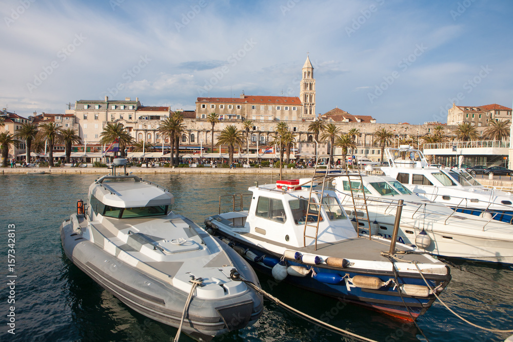 The Diocletian Palace from the harbor with ships in the front in Split City, Croatia
