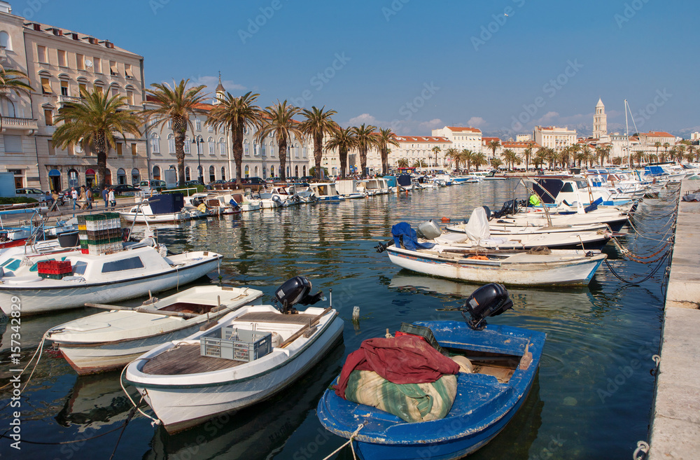 Split City, boats in Harbor and the Diocletian Palace in the background