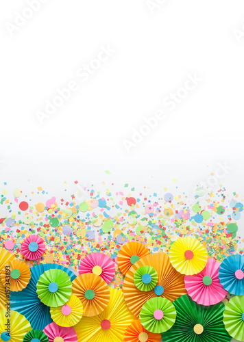 Colorful bright paper rosette. Decorating for a party. White background.
