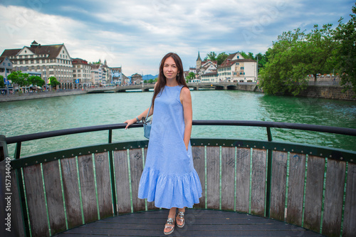 Beautiful woman enjoy vacation outdoors in Zurich, Switzerland. © travnikovstudio