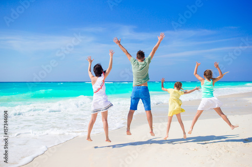 Happy family on a tropical beach