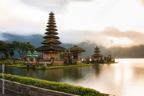 A beautiful sunrise at a Lake Bratan with Pura Ulun Danu Bratan Temple, Hindu temple on Bratan lake landscape, Major Shivaite and water temple Bali, one of famous tourist attraction in Bali Indonesia