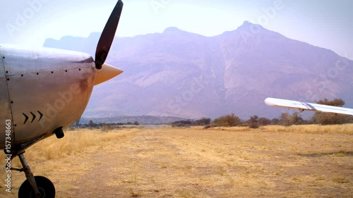 Takeoff of an airplane in the desert photo