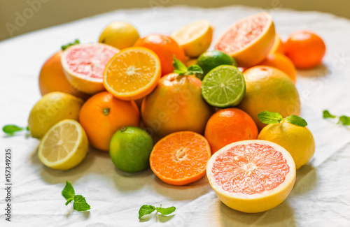 Fototapeta Naklejka Na Ścianę i Meble -  A large assortment of colorful citrus fruit (lemon, lime, orange, grapefruit, mandarin, tangerine, pomelo)