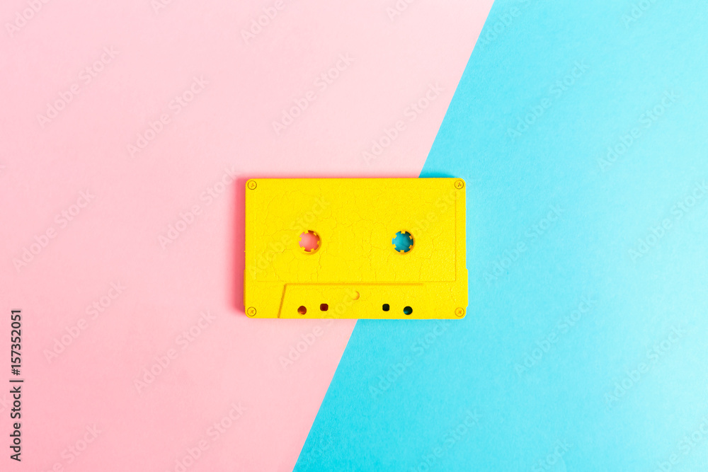 Retro cassette tapes on bright background
