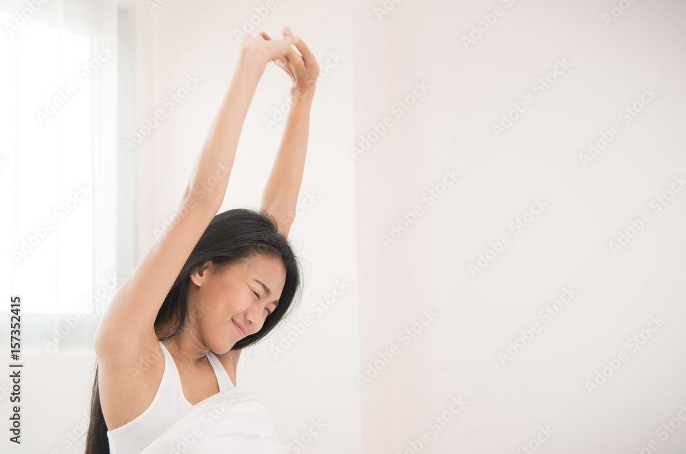 Beautiful Asian woman waking up in the morning. Beautiful Asian woman waking up in the morning.