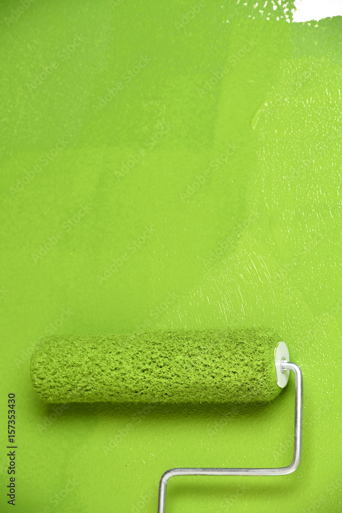 Obraz premium Paint Roller on White Wall