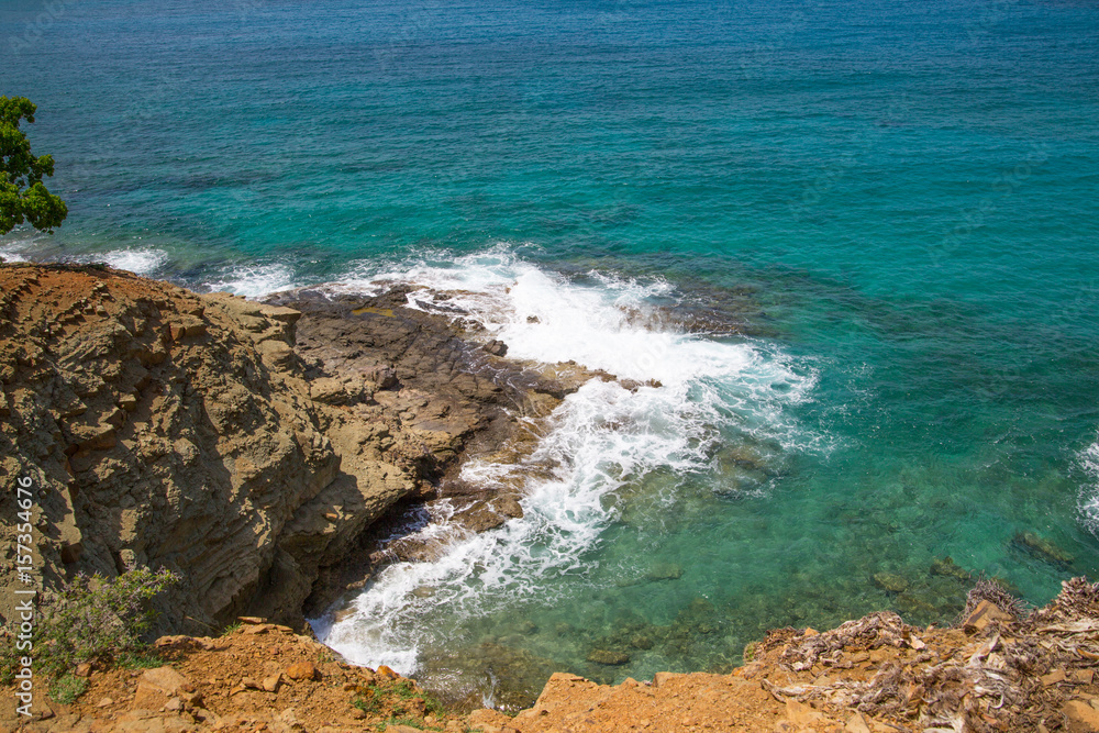 Rocks and ocean waves. Antigua, English Harbour