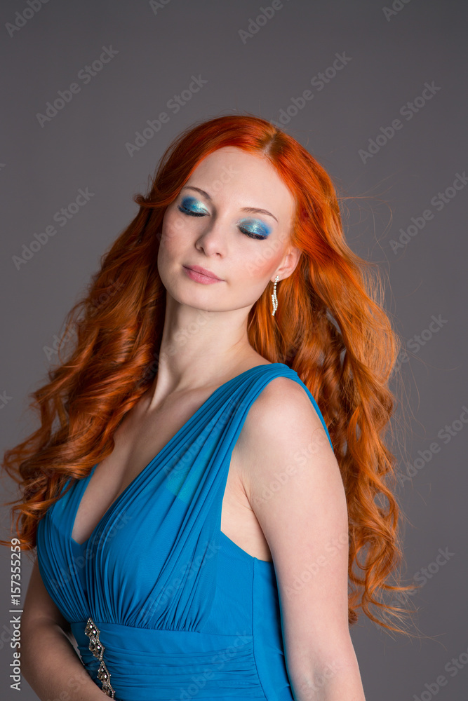 Young woman with long red hair Young woman with long red hair