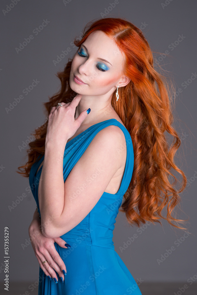 Young woman with long red hair Young woman with long red hair