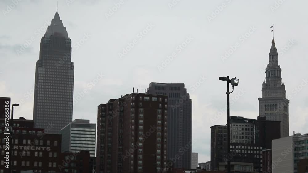 Establishing shot of Cleveland Ohio skyscapers during summer as seen from the flats Establishing shot of Cleveland Ohio skyscapers during summer as seen from the flats