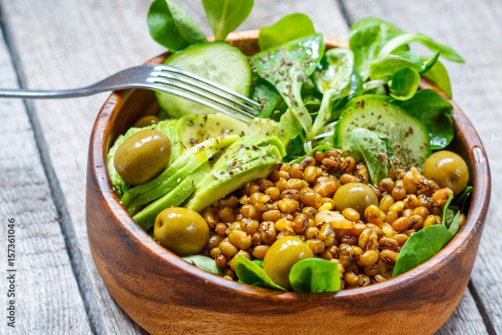 Healthy green salad with mung beans. Love for a healthy vegan food concept Healthy green salad with mung beans. Love for a healthy vegan food concept