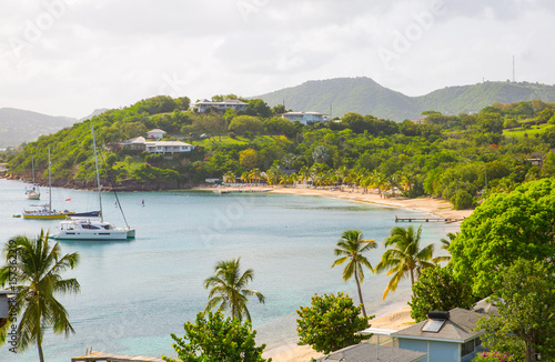 Antigua, Caribbean islands,  English harbour view with Freeman’s bay and yachts anchored by the beach  photo