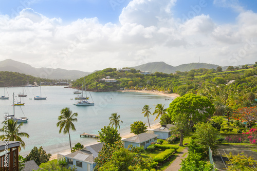 Antigua, Caribbean islands,  English harbour view with Freeman’s bay and yachts anchored by the beach 