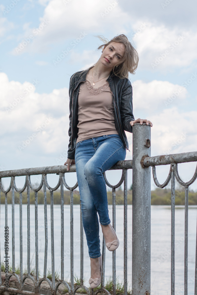 Girl with blond hair on the promenade