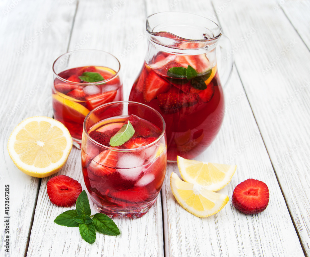 Glasses of lemonade with strawberries Glasses of lemonade with strawberries