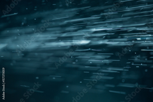 abstract White flakes on blue night background