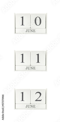 Closeup group of white wooden calendar with black 10 june , 11 june , 12 june word , three date calendar isolated on white background