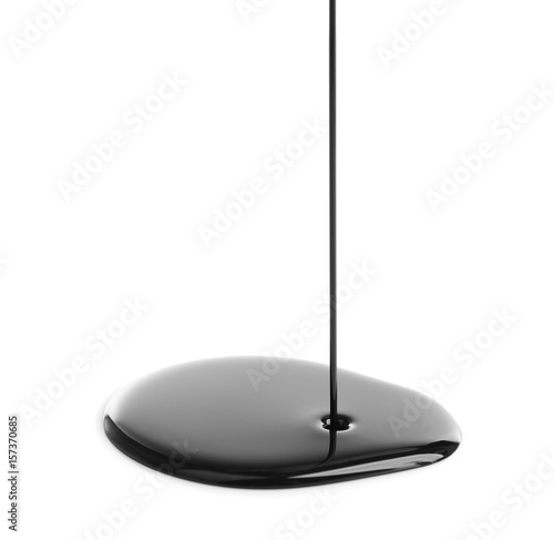 Pouring oil on white background