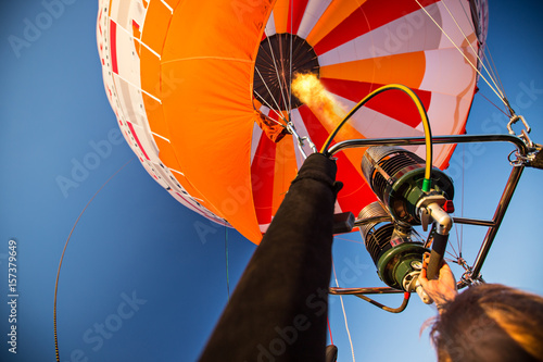 A hot air baloon rising hig...
