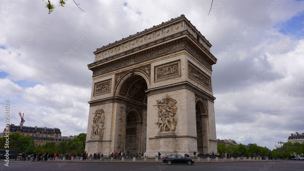 Obraz premium Photo of Arc de Triomphe on a cloudy spring morning, Paris, France