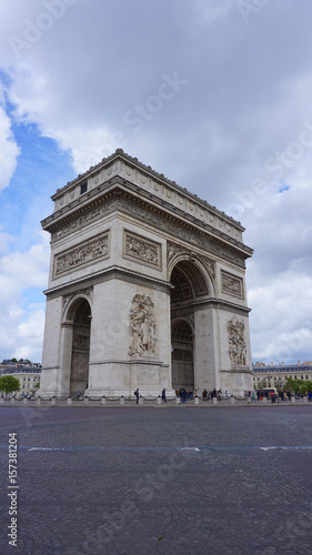 Photo of Arc de Triomphe on a cloudy spring morning, Paris, France © aerial-drone