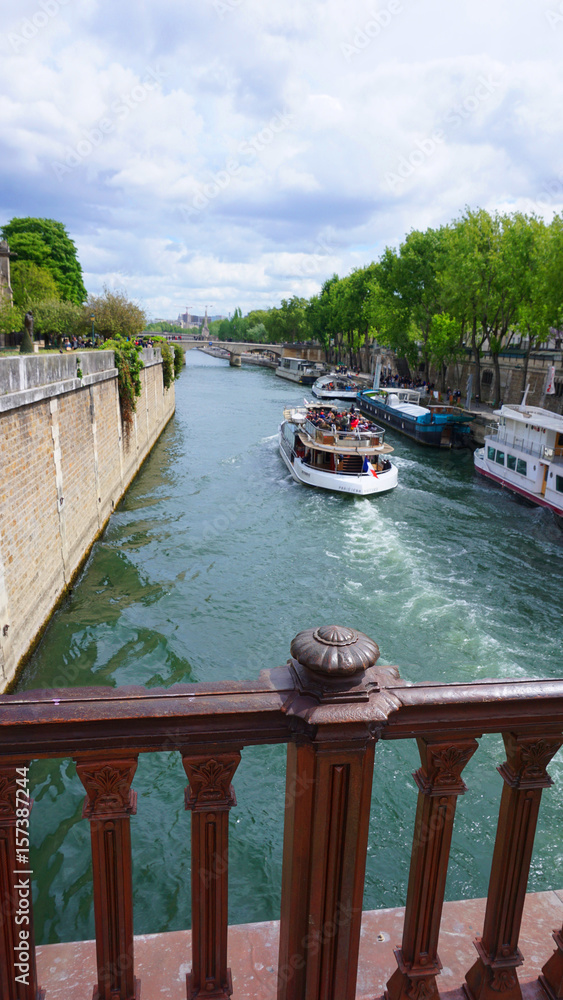 Fototapeta premium Photo of canal and bridges near Notre Dame, Paris, France
