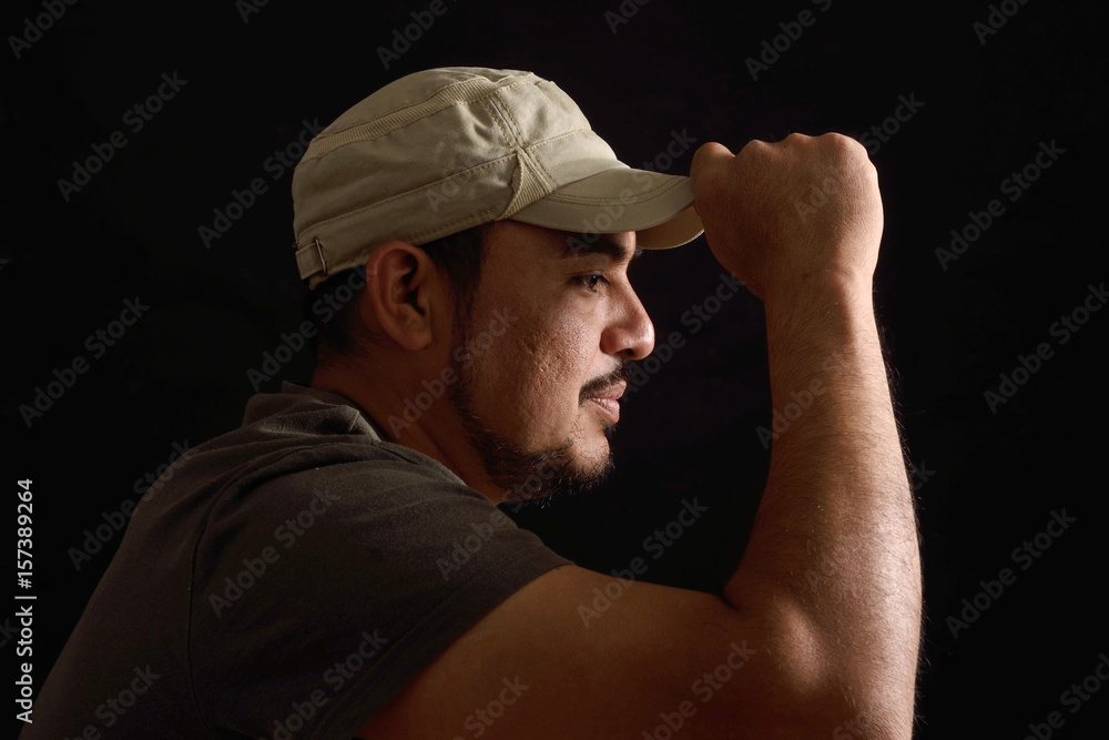Portrait of a latin man on black background Portrait of a latin man on black background